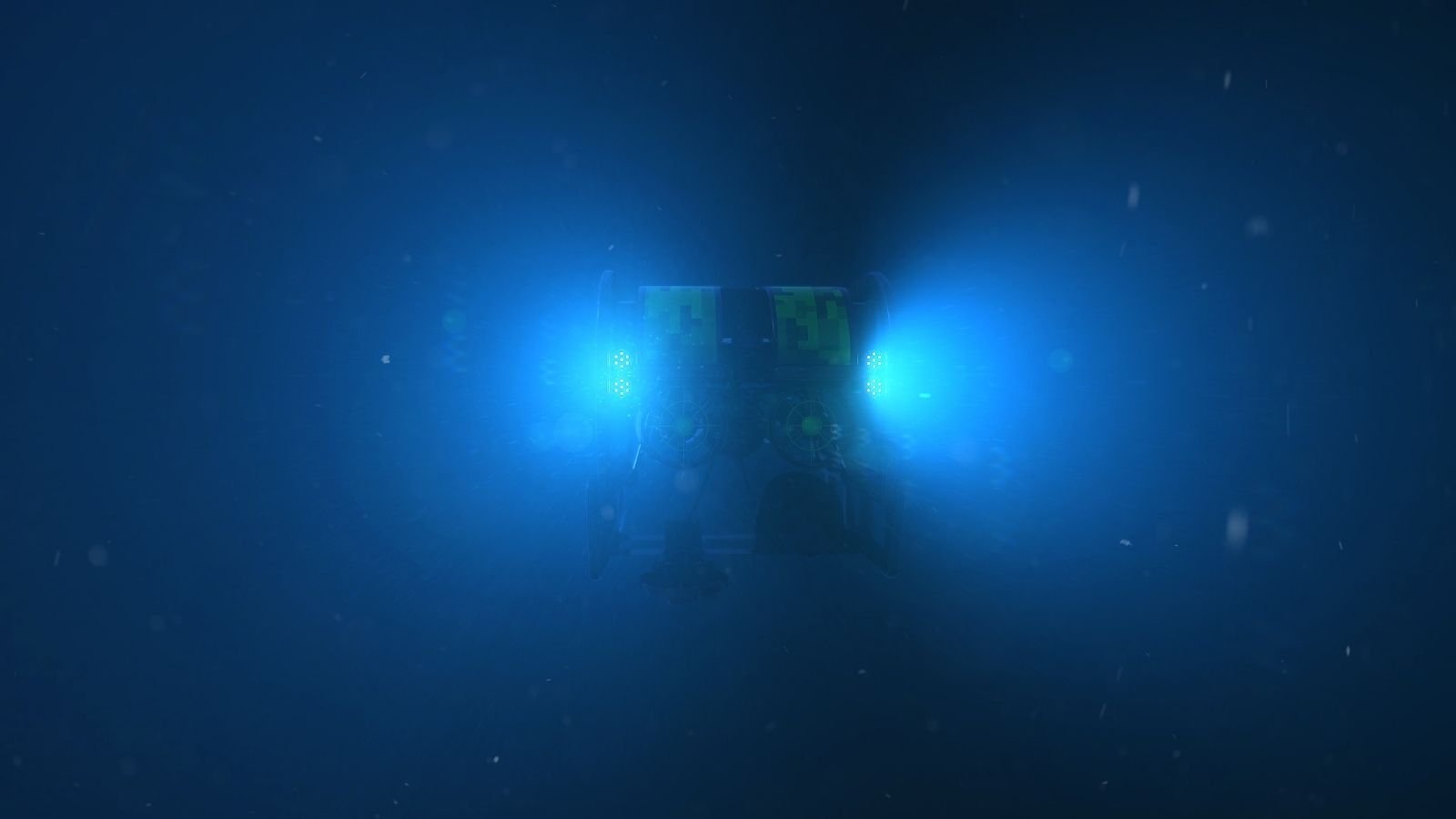 A deep-sea submarine is illuminated by bright blue lights in a dark, murky underwater environment.