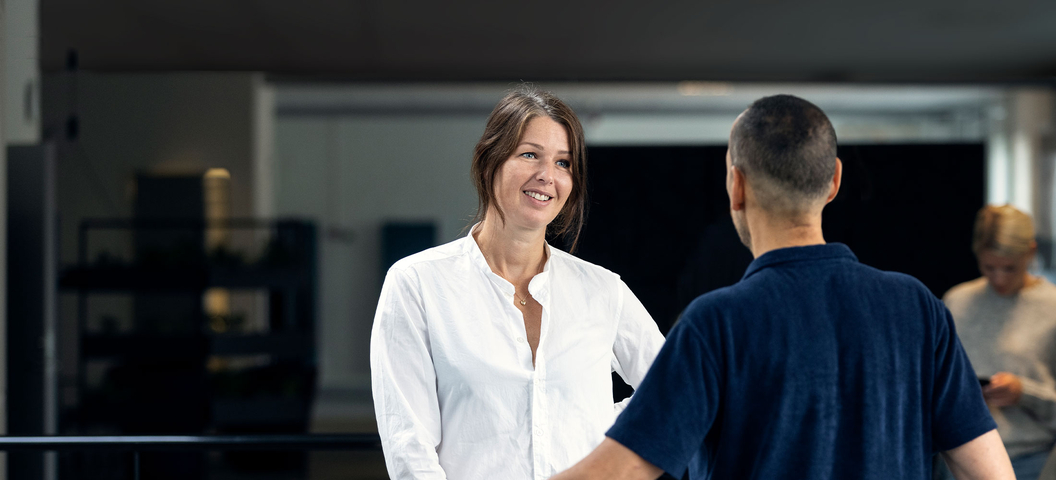 two-employees-talking